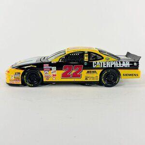Hot wheels 1999 NASCAR Ward Burton #22 Caterpillar Pontiac 1:24 Diecast Car